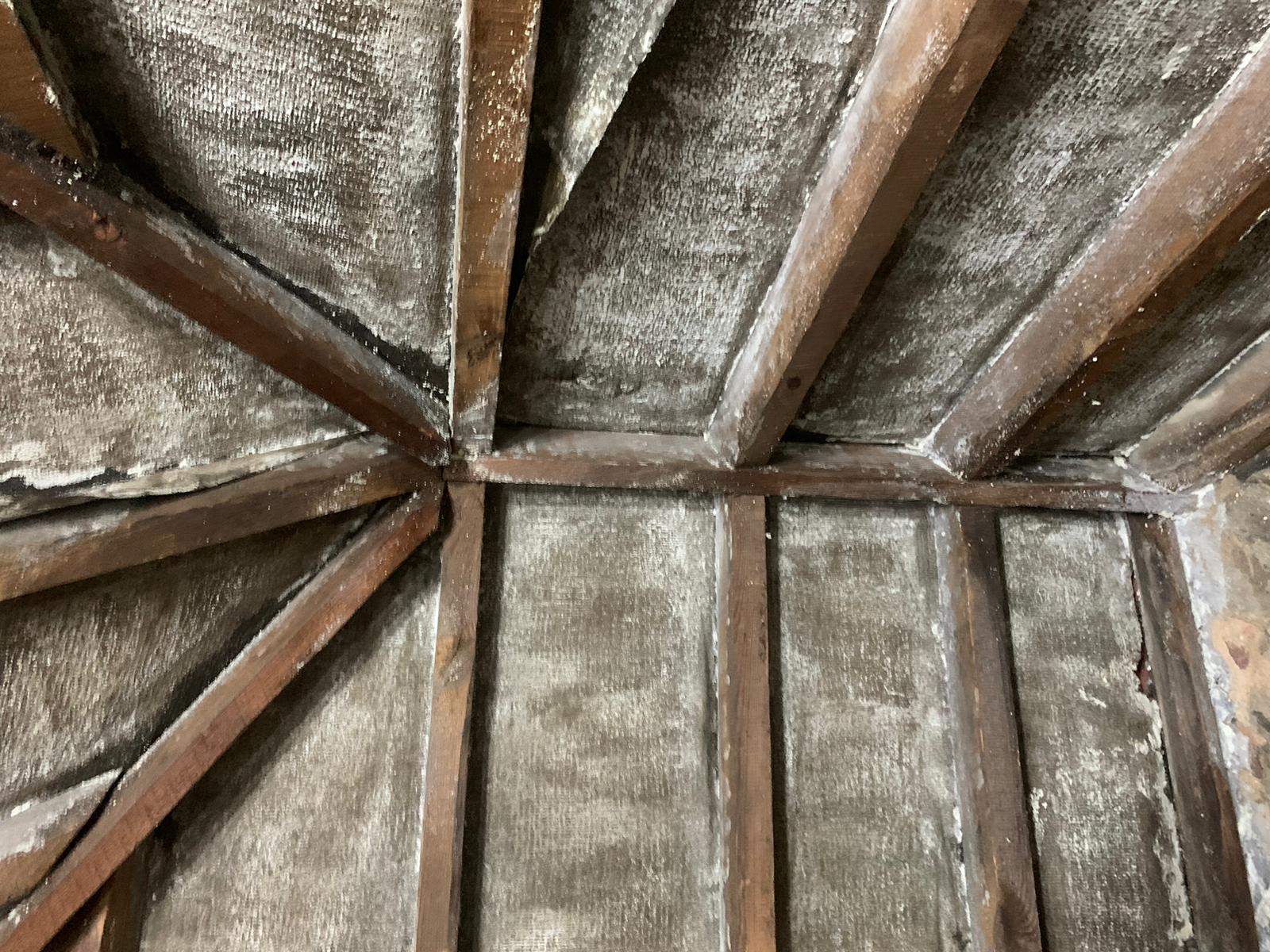Multi-foil insulation fitted between the rafters of a hipped roof